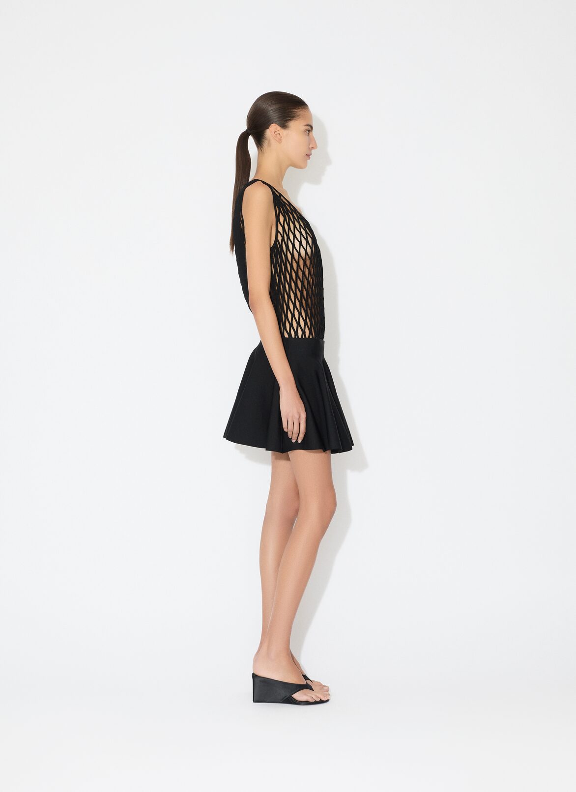 MACRAMÉ KNIT SKATER DRESS ALAÏA BLACK MACRAMÉ KNIT SKATER DRESS